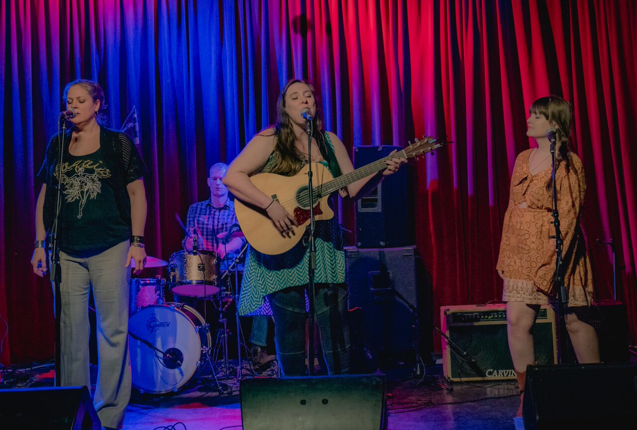 L-R: Irene Allen, Russ McCanless, Langen Neubacher (with guitar), and Devon Cahill